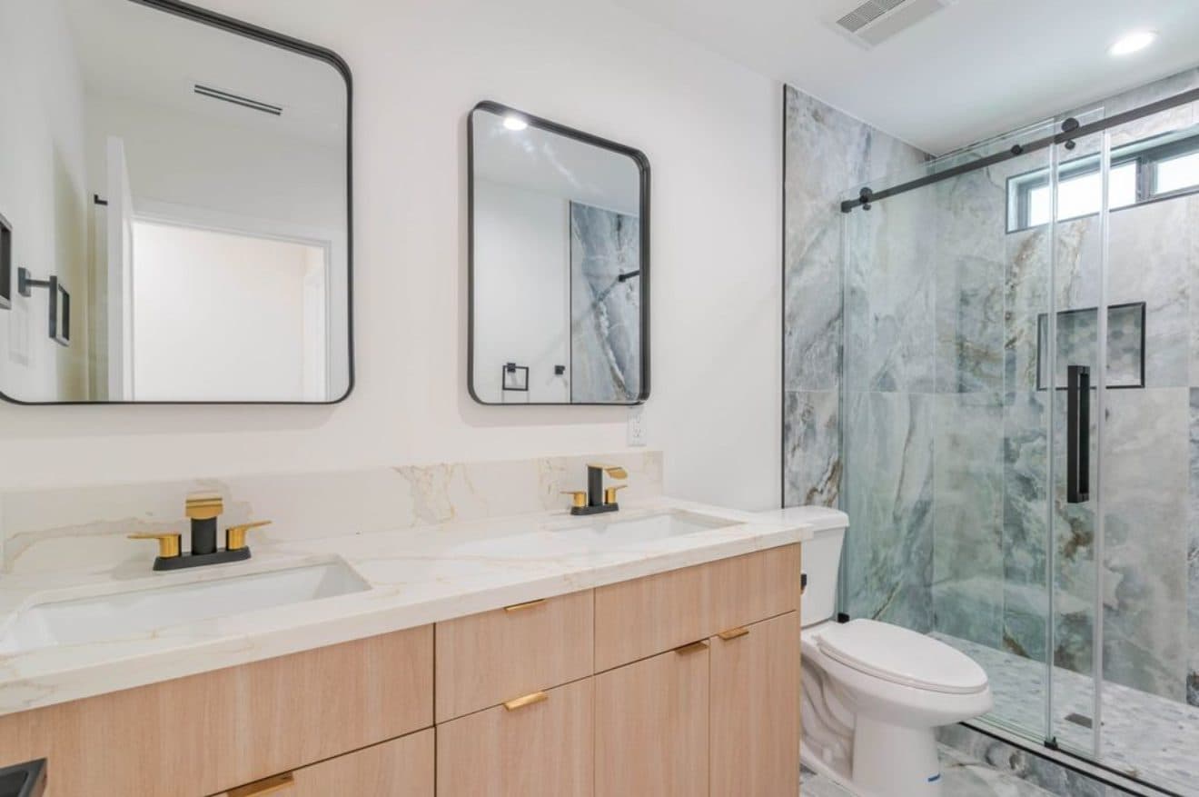 Ensuite bath with double vanity and stone shower